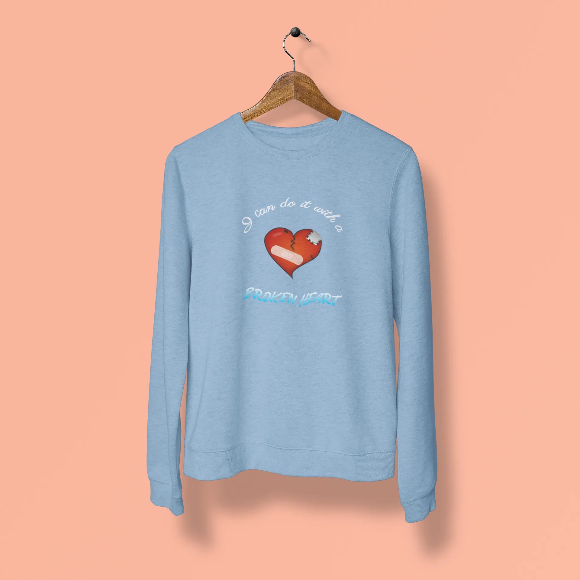 i can do it with a broken heart unisex sweatshirt baby blue